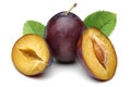 Damson plums with leaf isolated on white Royalty Free Stock Photo