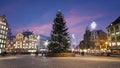 The damsquare at christmas in Amsterdam the Netherlands at sunset Royalty Free Stock Photo