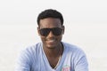 Danakil, Ethiopia, January 22 2015: A handsome young Ethiopian posing with sunglasses in the Danakil desert