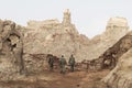 Danakil, Ethiopia, January 22 2015: Three soldiers review the security situation in the Salt Mountains in the Danakil desert