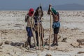 DANAKIL, ETHIOPIA - MARCH 24, 2019: Afar tribe salt miners in the Danakil depression, Ethiopi