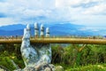 Danang, Vietnam - JUNE, 24, 2019: The Golden Bridge in the Bana Valley, supported by a giant hand This bridge is 1,400 meters