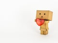 Danbo holding a heart