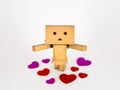 Danbo standing amongst hearts