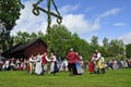 Dance around the midsummer tree Royalty Free Stock Photo