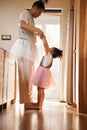 Dance, ballet and help with father and daughter for learning, support and love. Music, holding hands and youth with man Royalty Free Stock Photo