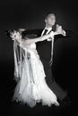 Dance ballroom couple in red dress dance pose isolated on black background. sensual professional dancers dancing walz, tango, slow