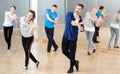 Adult people training in dance studio Royalty Free Stock Photo