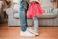 Dance, feet and home with father and daughter in living room for ballet, princess and love. Music, care and learning Royalty Free Stock Photo