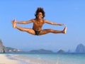 Dance jump on tropical beach Royalty Free Stock Photo