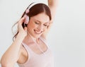 Dance like nobodys watching. Portrait of a woman absorbed in her music. Royalty Free Stock Photo