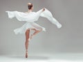 Dance is my form of expression. Full length shot of an unrecognisable ballerina dancing alone in the studio.