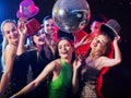 Dance party with group people dancing and disco ball. Royalty Free Stock Photo