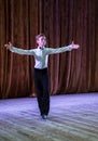 Dance school. Pupils take exams. Boys and girls in beautiful dance costumes on stage