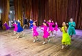 Dance school. Pupils take exams. Boys and girls in beautiful dance costumes on stage