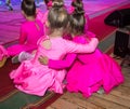 Dance school. Pupils take exams. Boys and girls in beautiful dance costumes on stage