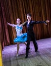 Dance school. Pupils take exams. Boys and girls in beautiful dance costumes on stage