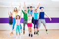 Dance teacher giving kids Zumba fitness class Royalty Free Stock Photo