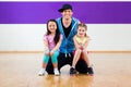 Dance teacher giving kids Zumba fitness class Royalty Free Stock Photo