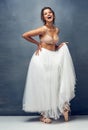 Dance your way through life. Portrait of a beautiful young woman posing in studio while wearing a bra and ballet skirt.