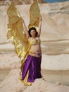Dancer with gold wings Royalty Free Stock Photo