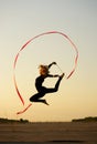 Dancer jumping with ribbon Royalty Free Stock Photo