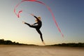 Dancer jumping with ribbon Royalty Free Stock Photo