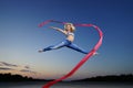 Dancer jumping with ribbon Royalty Free Stock Photo