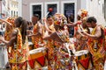 Dancer`s small parade with traditional costumes and instruments celebrating with revelers the Carnival, Brazil