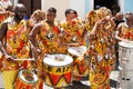 Dancer`s small parade with traditional costumes and instruments celebrating with revelers the Carnival, Brazil