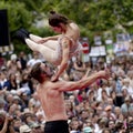 Dancer throwing his partner high in the air.