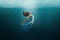 Dancer underwater in a state of peaceful levitation