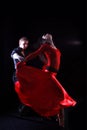 Dancers against black background Royalty Free Stock Photo