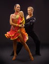 Dancers against black background Royalty Free Stock Photo