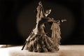 Dancers in ballroom against black background Royalty Free Stock Photo