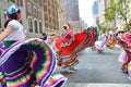 Dancers in bright costumes performing during the Mexican Independence Day Parade