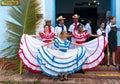 Dancers in coustumes welcoming tourists in Trinidad