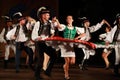 Slovakian traditional dance group performing dance in pairs Royalty Free Stock Photo