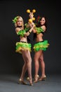 Dancers with maracas Royalty Free Stock Photo