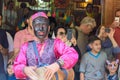 Dancers musicians with black face dance in the street in Bazaar to spread good cheer in Nowruz holidays. Shiraz. Iran