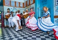 Dancers and musicians perform cuban folk dance