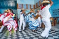 Dancers and musicians perform cuban folk dance