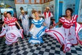 Dancers and musicians perform cuban folk dance