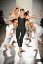 A dancers performs on the runway at the DL 1961 Premium Denim spring 2013 fashion show