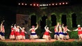 Spectacular folklore dance group stage performance