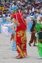 Dancers in typical costumes of devils, angels, Chinese and brunettes celebrate the festival of the Virgen de la Candelaria.