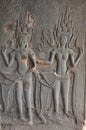 Dancing Apsaras on the wall in Angkor Wat temple