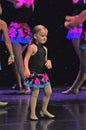 Young girl dancing on stage