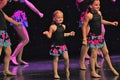 Young girl dancing on stage