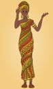 Dancing beautiful African woman in turban and traditional costume with ethnic geometric ornament full length.